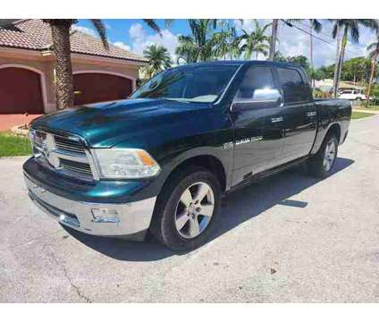 2011 Ram 1500 Crew Cab for sale is a Green 2011 RAM 1500 Model Car for Sale in Pompano Beach FL