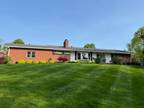 inviting mid-century brick ranch located in the village of Goshen