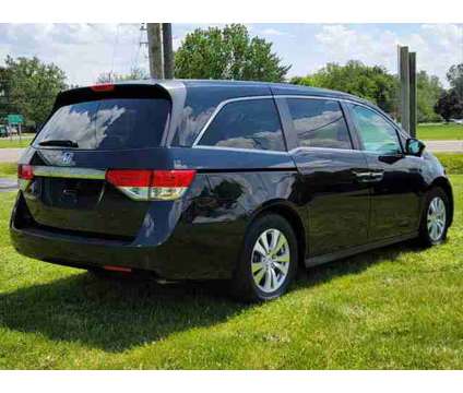 2014 Honda Odyssey for sale is a Black 2014 Honda Odyssey Car for Sale in Adrian MI
