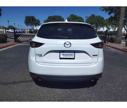 2021 Mazda CX-5 Touring is a White 2021 Mazda CX-5 Touring Car for Sale in Gilbert AZ