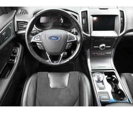 2019 Ford Edge ST is a Silver, White 2019 Ford Edge SUV in Dubuque IA