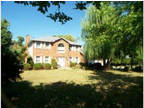 3-4 Bedroom Executive Home on 5 Acres has 4 Baths and a 3 Car Garage!!