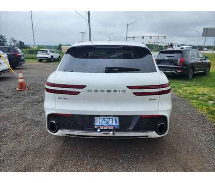 2024 Genesis GV70 2.5T AWD is a White 2024 SUV in Manchester NH