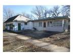 Foreclosure Property: E 17th St N