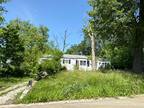 Foreclosure Property: Woods St