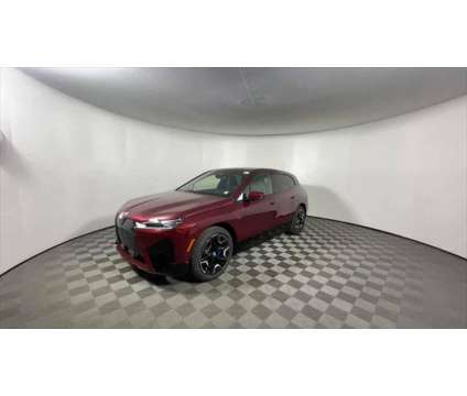 2025 BMW iX xDrive50 is a Red 2025 BMW 325 Model iX SUV in Freeport NY