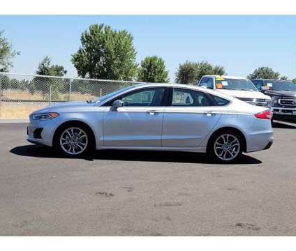 2020 Ford Fusion SEL is a Silver 2020 Ford Fusion SEL Sedan in Hanford CA