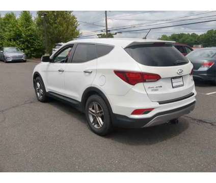 2018 Hyundai Santa Fe Sport 2.4L is a White 2018 Hyundai Santa Fe Sport 2.4L SUV in Watertown CT