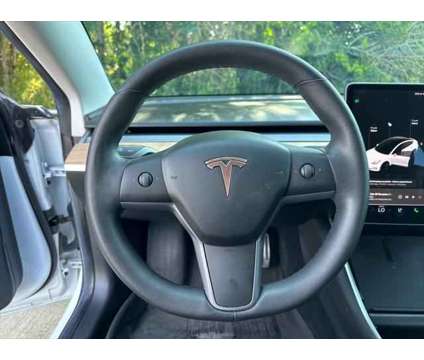2019 Tesla Model 3 Long Range is a White 2019 Tesla Model 3 Long Range Sedan in Brookshire TX