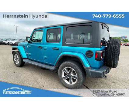 2019 Jeep Wrangler Unlimited Sahara is a White 2019 Jeep Wrangler Unlimited Sahara SUV in Chillicothe OH