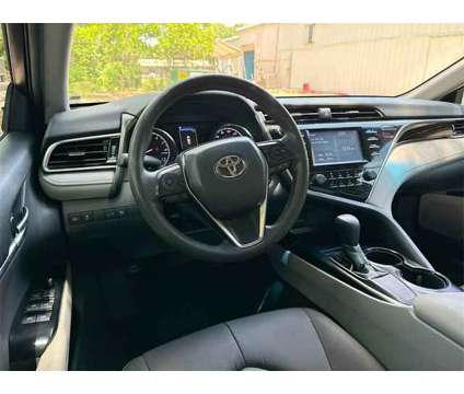 2018 Toyota Camry LE is a Grey 2018 Toyota Camry LE Sedan in Gulfport MS