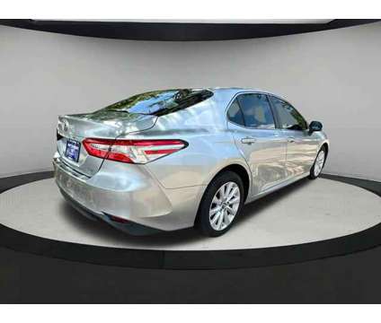 2018 Toyota Camry LE is a Grey 2018 Toyota Camry LE Sedan in Gulfport MS