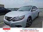 2017 Nissan Altima with 129,625 miles!