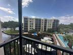 peaceful marina and pool view 20 Royal Palm Way #404