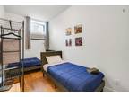 Bed in a nice twin bedroom, in Williamsburg