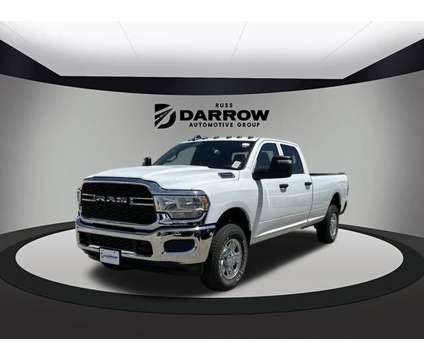 2024 Ram 2500 Tradesman is a White 2024 RAM 2500 Model Tradesman Truck in Milwaukee WI