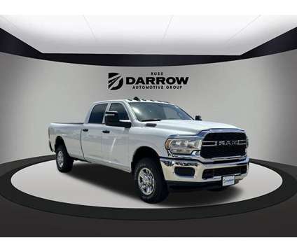 2024 Ram 2500 Tradesman is a White 2024 RAM 2500 Model Tradesman Truck in Milwaukee WI