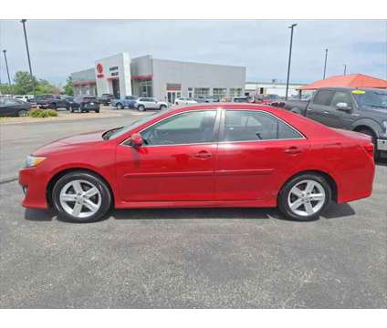 2014 Toyota Camry SE Sport is a Red 2014 Toyota Camry SE Sedan in Dubuque IA