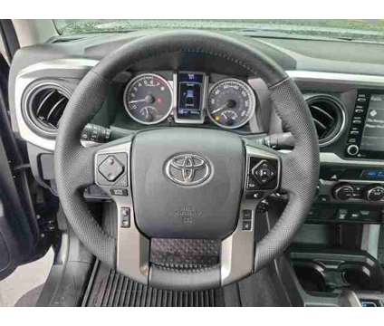2023 Toyota Tacoma SR5 V6 is a Black 2023 Toyota Tacoma SR5 Truck in Plainfield CT