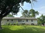 Foreclosure Property: E 34th Ter S