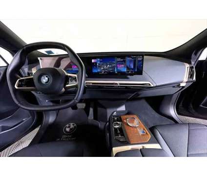 2023 BMW iX M60 is a Grey 2023 BMW 325 Model iX SUV in Freeport NY