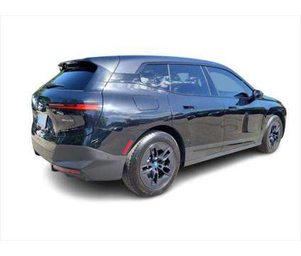 2024 BMW iX xDrive50 is a Black 2024 BMW 325 Model iX SUV in Morristown NJ