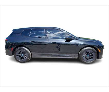 2024 BMW iX xDrive50 is a Black 2024 BMW 325 Model iX SUV in Morristown NJ