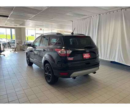 2018 Ford Escape SEL is a Black 2018 Ford Escape SEL SUV in Dubuque IA