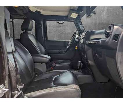 2014 Jeep Wrangler Unlimited Altitude is a Black 2014 Jeep Wrangler Unlimited Altitude SUV in Valencia CA