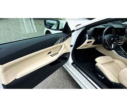 2024 BMW 4 Series 430i xDrive is a White 2024 BMW 430 Model i Convertible in Huntington Station NY