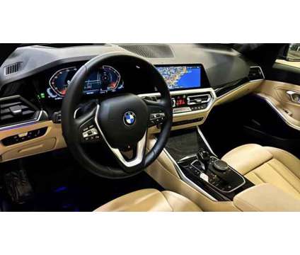 2021 BMW 3 Series xDrive is a Grey 2021 BMW 3-Series Sedan in Huntington Station NY