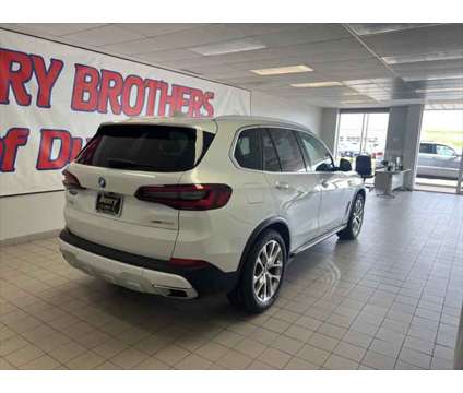 2023 BMW X5 xDrive45e is a White 2023 BMW X5 4.8is SUV in Dubuque IA
