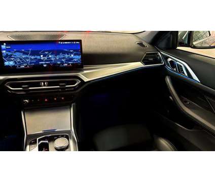 2024 BMW 4 Series 430i is a Grey 2024 BMW 430 Model i Convertible in Huntington Station NY