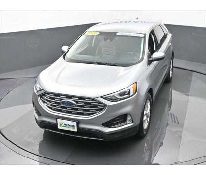 2021 Ford Edge SEL is a Silver 2021 Ford Edge SEL SUV in Dubuque IA