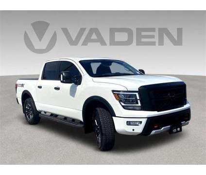 2024 Nissan Titan Crew Cab PRO-4X 4x4 is a White 2024 Nissan Titan Crew Cab Truck in Savannah GA