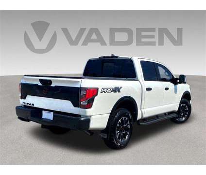 2024 Nissan Titan Crew Cab PRO-4X 4x4 is a White 2024 Nissan Titan Crew Cab Truck in Savannah GA