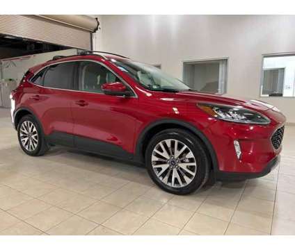 2020 Ford Escape Titanium Hybrid is a Red 2020 Ford Escape Titanium Hybrid in Cottonwood AZ