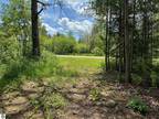 Oscoda, Nicely wooded, over 1/2 acre lot, very close to