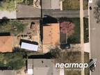 Foreclosure Property: Laramie Ave