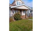 Foreclosure Property: Woodlawn St