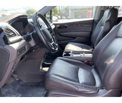 2019 Honda Odyssey Elite is a Black 2019 Honda Odyssey Elite Van in Woods Cross UT