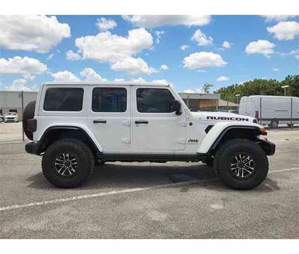 2024 Jeep Wrangler Rubicon is a White 2024 Jeep Wrangler Rubicon Car for Sale in Orlando FL