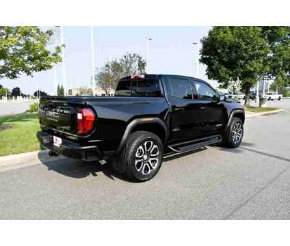 2023 GMC Canyon AT4 is a Black 2023 GMC Canyon Truck in Plover WI