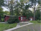 Sandstone Home on 10 Wooded Acres w/Outbuilding