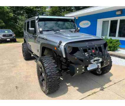 2014 Jeep Wrangler for sale is a Silver 2014 Jeep Wrangler Car for Sale in Vineland NJ