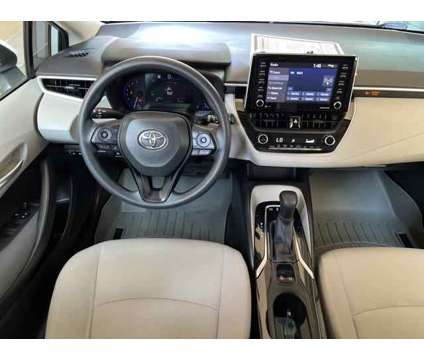 2021 Toyota Corolla Hybrid LE is a White 2021 Toyota Corolla Hybrid in Bakersfield CA