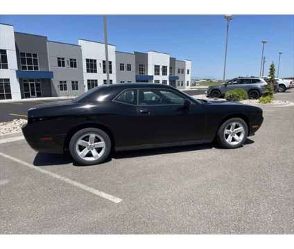 2014 Dodge Challenger SXT is a Black 2014 Dodge Challenger SXT Coupe in Logan UT