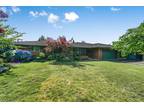 Charming ranch-style home with a stunning pool!