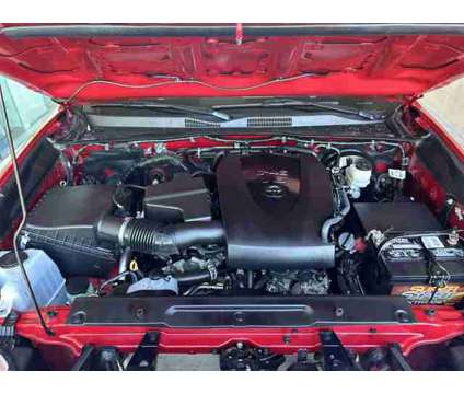 2022 Toyota Tacoma SR5 V6 is a Red 2022 Toyota Tacoma SR5 Truck in Bakersfield CA