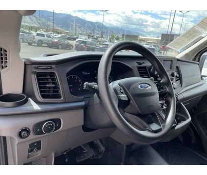 2023 Ford Transit Base is a White 2023 Ford Transit Van in Logan UT